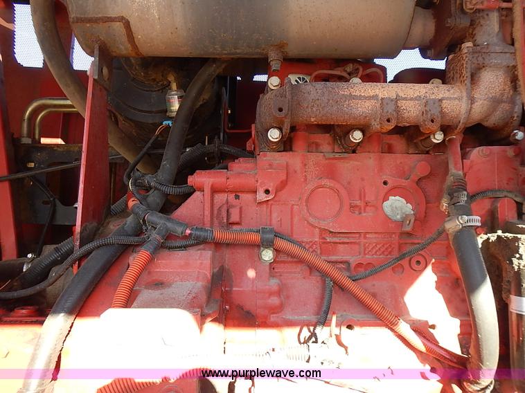 image for item I9407 2005 New Holland HW305 self-propelled windrower