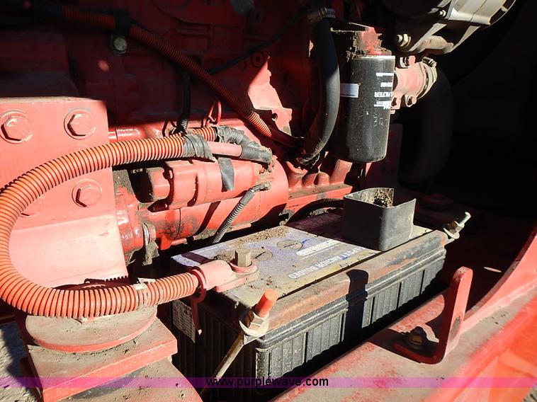 image for item I9407 2005 New Holland HW305 self-propelled windrower