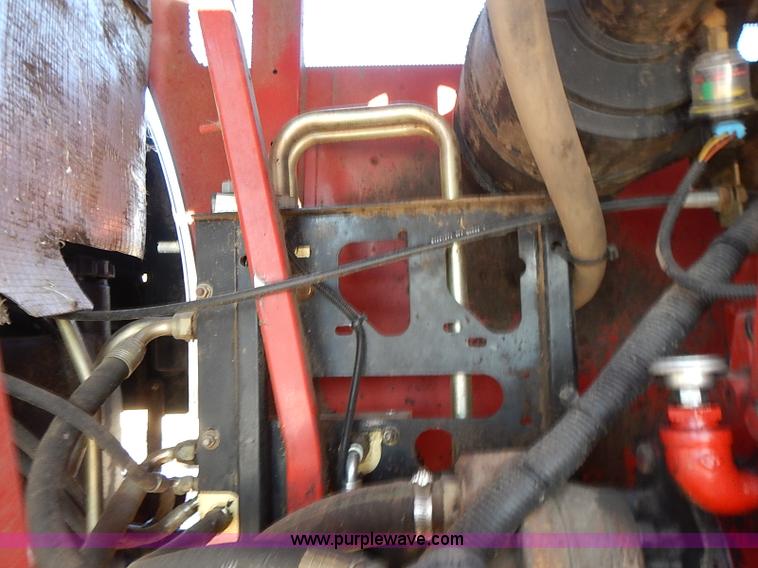 image for item I9407 2005 New Holland HW305 self-propelled windrower