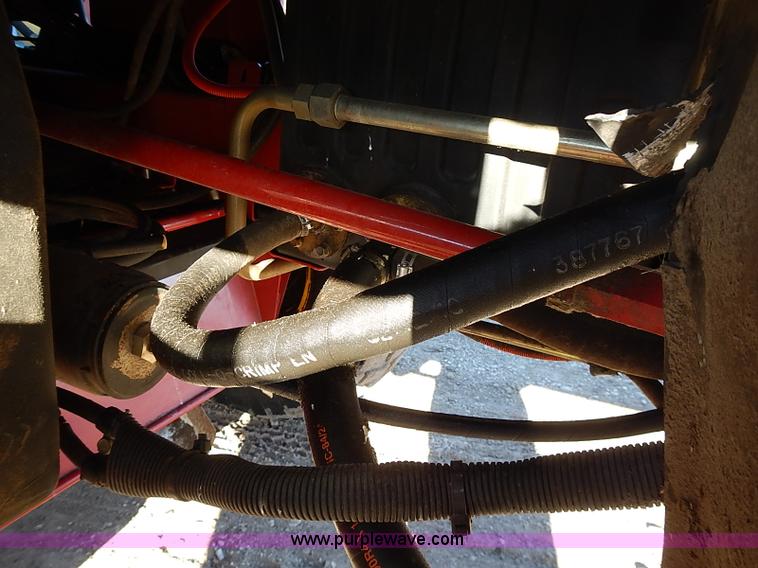 image for item I9407 2005 New Holland HW305 self-propelled windrower