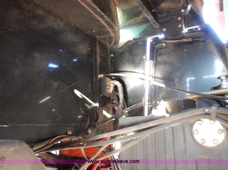 image for item I9407 2005 New Holland HW305 self-propelled windrower