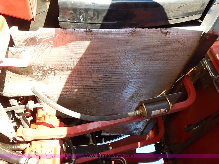 image for item I9407 2005 New Holland HW305 self-propelled windrower