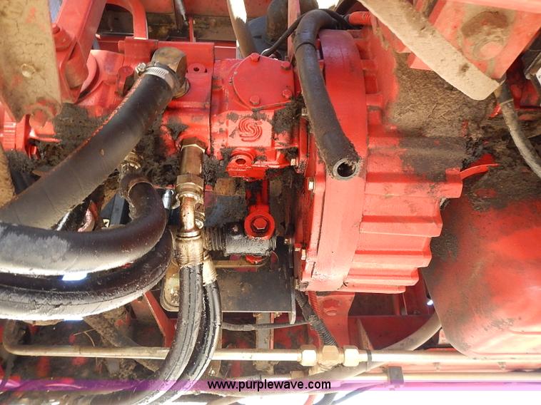 image for item I9407 2005 New Holland HW305 self-propelled windrower