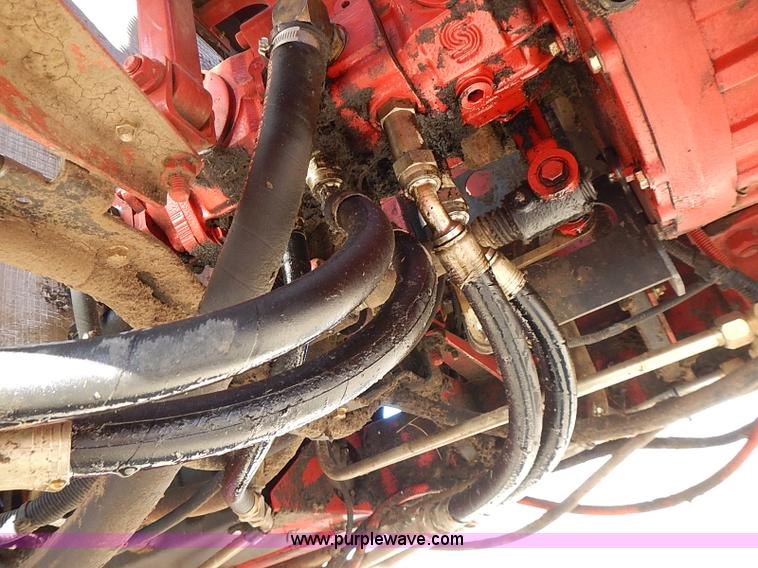 image for item I9407 2005 New Holland HW305 self-propelled windrower