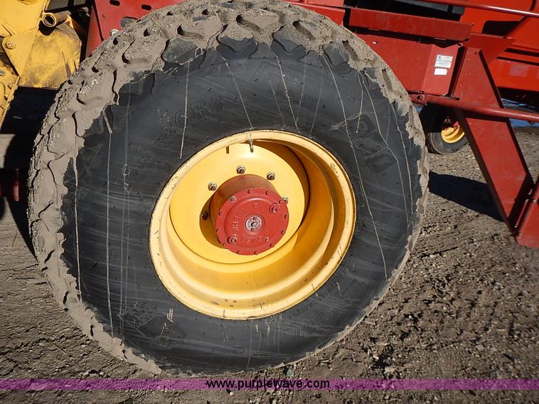 image for item I9407 2005 New Holland HW305 self-propelled windrower