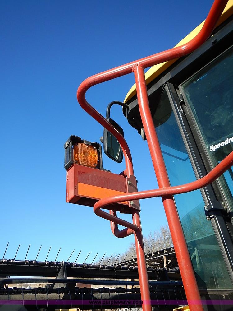 image for item I9407 2005 New Holland HW305 self-propelled windrower