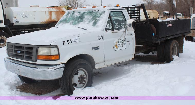 image for item H1304 1994 Ford F350 XL flatbed pickup truck