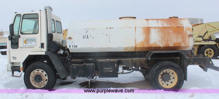 image for item H1305 1990 Ford CF8000 Cargo water tuck