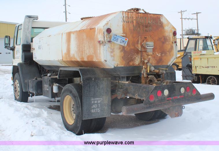 image for item H1305 1990 Ford CF8000 Cargo water tuck