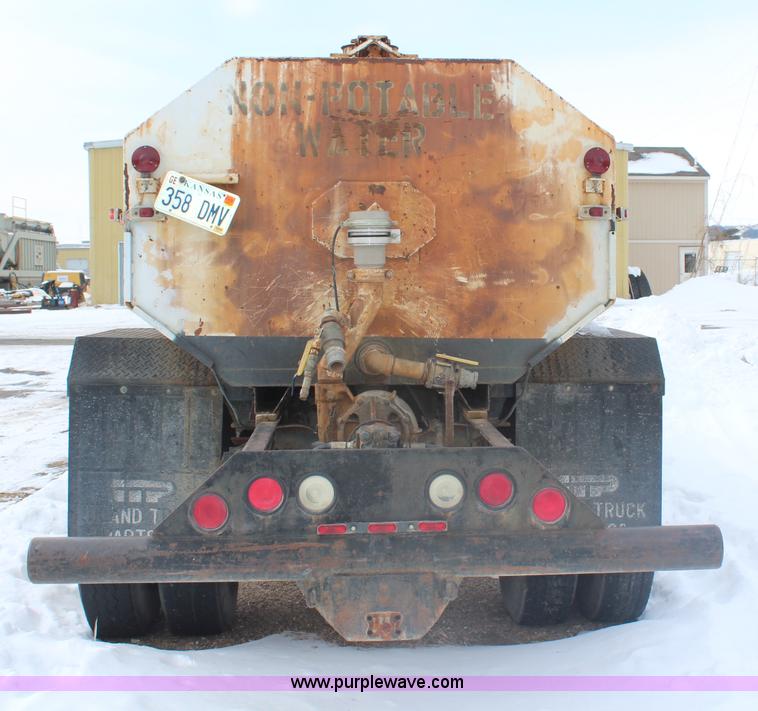 image for item H1305 1990 Ford CF8000 Cargo water tuck