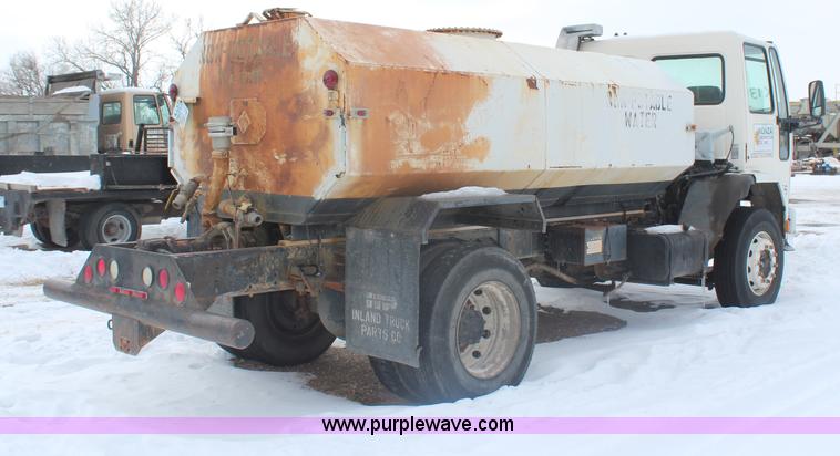 image for item H1305 1990 Ford CF8000 Cargo water tuck