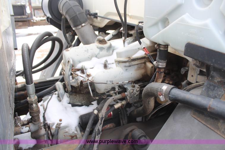 image for item H1305 1990 Ford CF8000 Cargo water tuck