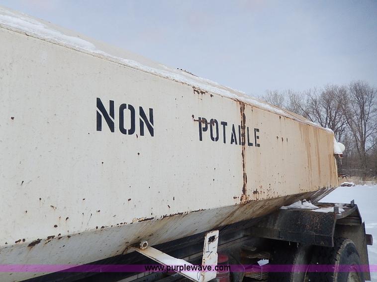 image for item H1306 1990 Ford CF8000 Cargo water tuck