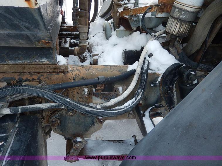 image for item H1306 1990 Ford CF8000 Cargo water tuck