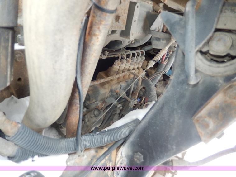 image for item H1306 1990 Ford CF8000 Cargo water tuck