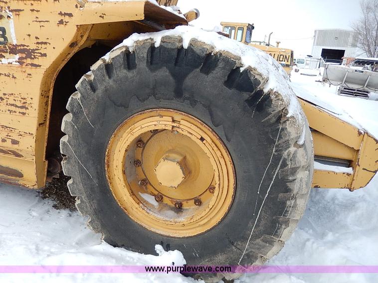 image for item H1307 1979 Caterpillar 613B paddle scraper