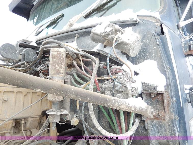 image for item H1311 1985 Ford LTL9000 dump truck