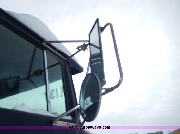 image for item H1311 1985 Ford LTL9000 dump truck