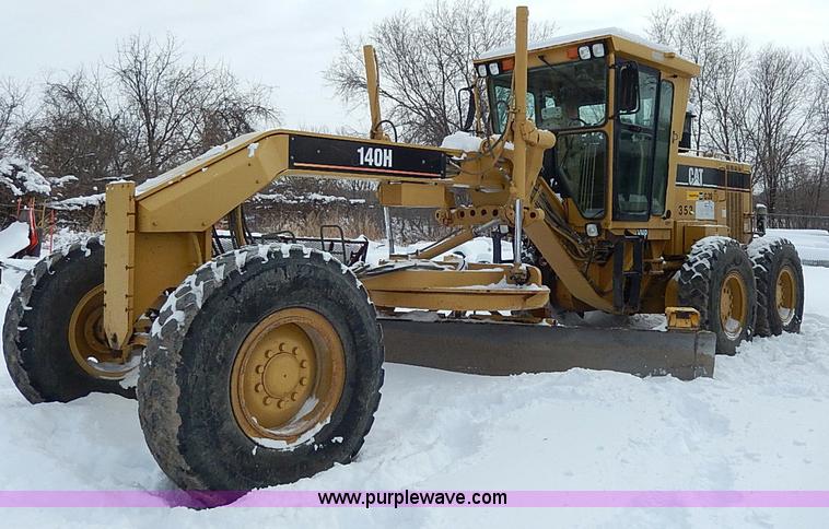image for item H1314 1999 Caterpillar 140H articulated motor grader