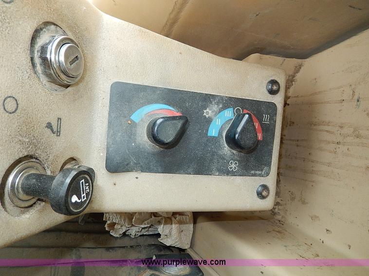 image for item H1314 1999 Caterpillar 140H articulated motor grader