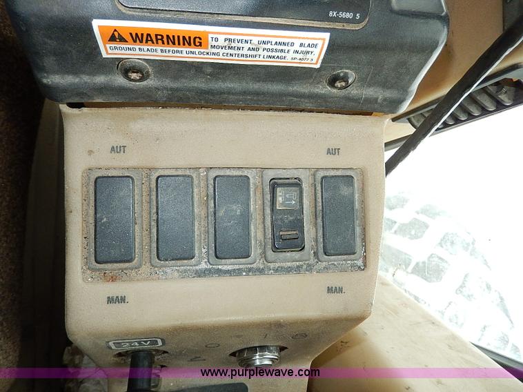 image for item H1314 1999 Caterpillar 140H articulated motor grader