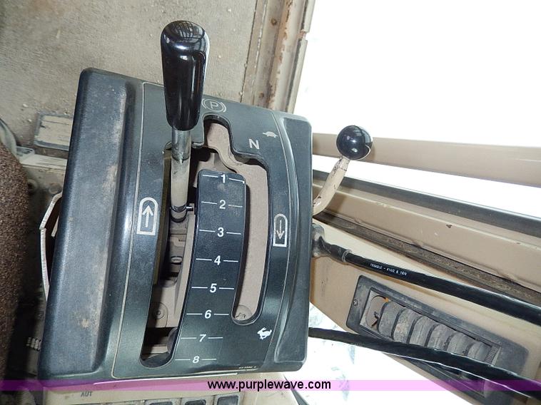 image for item H1314 1999 Caterpillar 140H articulated motor grader