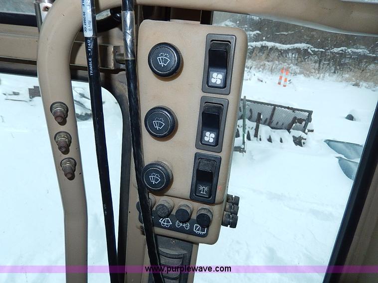 image for item H1314 1999 Caterpillar 140H articulated motor grader