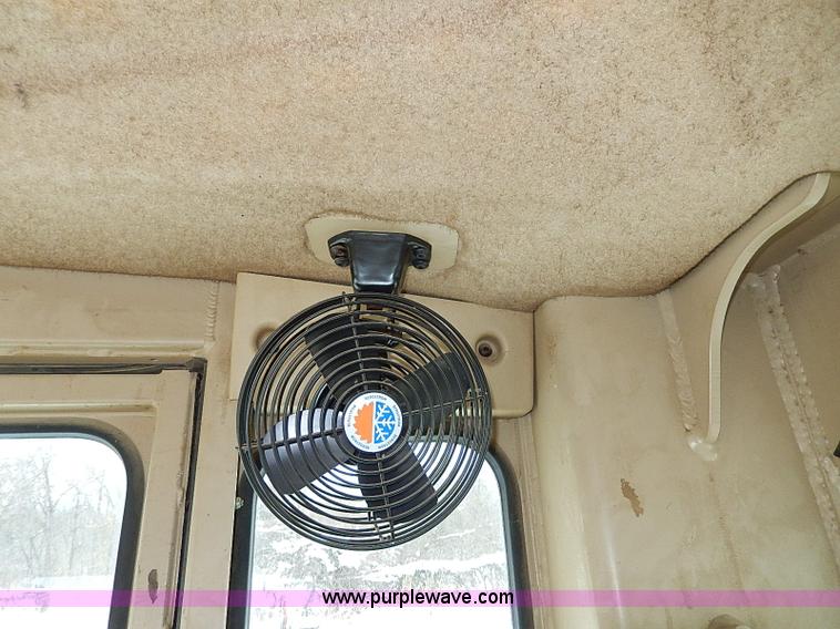 image for item H1314 1999 Caterpillar 140H articulated motor grader