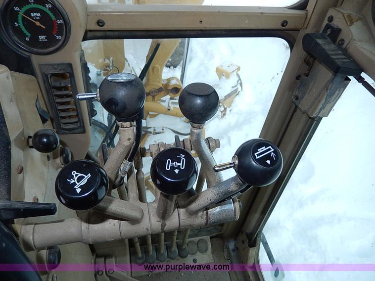 image for item H1314 1999 Caterpillar 140H articulated motor grader