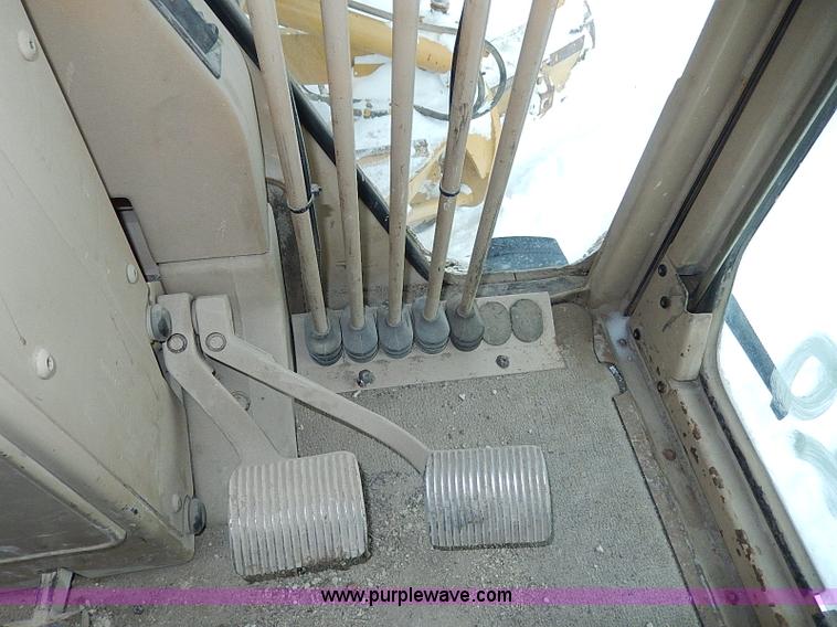 image for item H1314 1999 Caterpillar 140H articulated motor grader