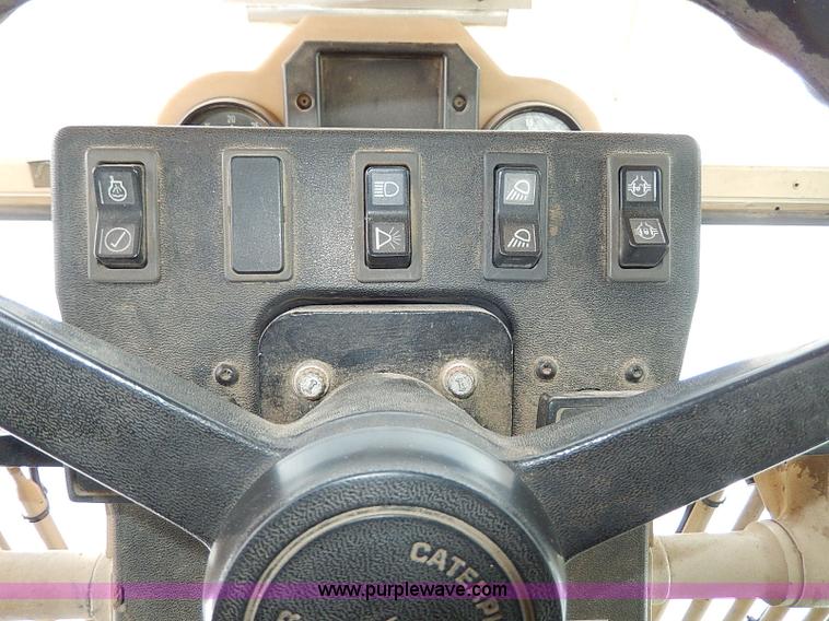 image for item H1314 1999 Caterpillar 140H articulated motor grader