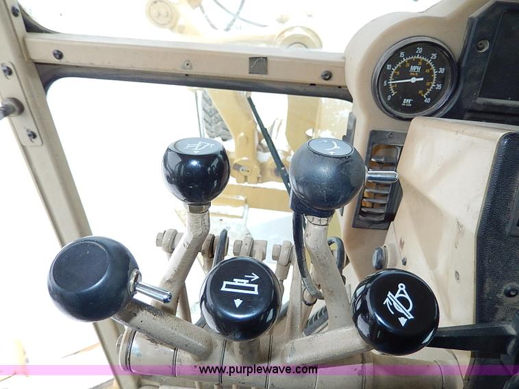 image for item H1314 1999 Caterpillar 140H articulated motor grader