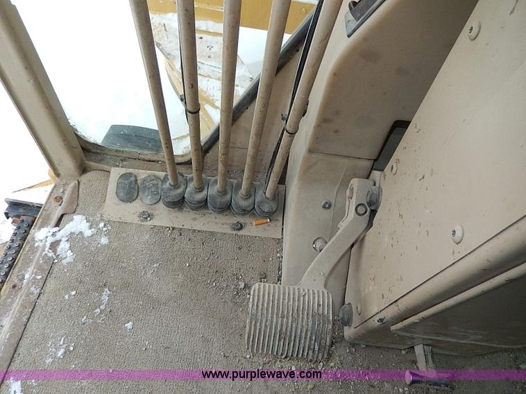 image for item H1314 1999 Caterpillar 140H articulated motor grader