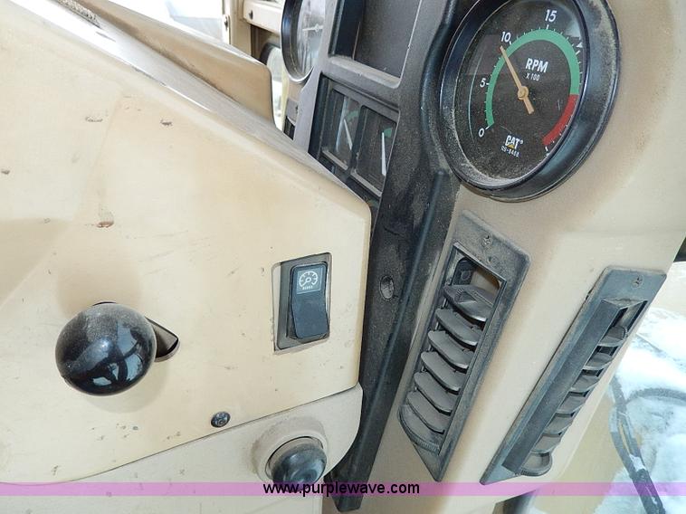 image for item H1314 1999 Caterpillar 140H articulated motor grader