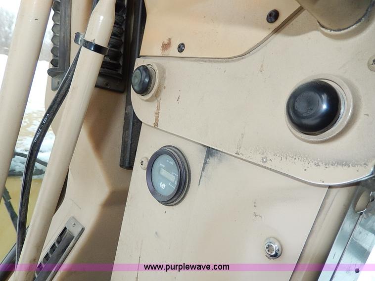 image for item H1314 1999 Caterpillar 140H articulated motor grader