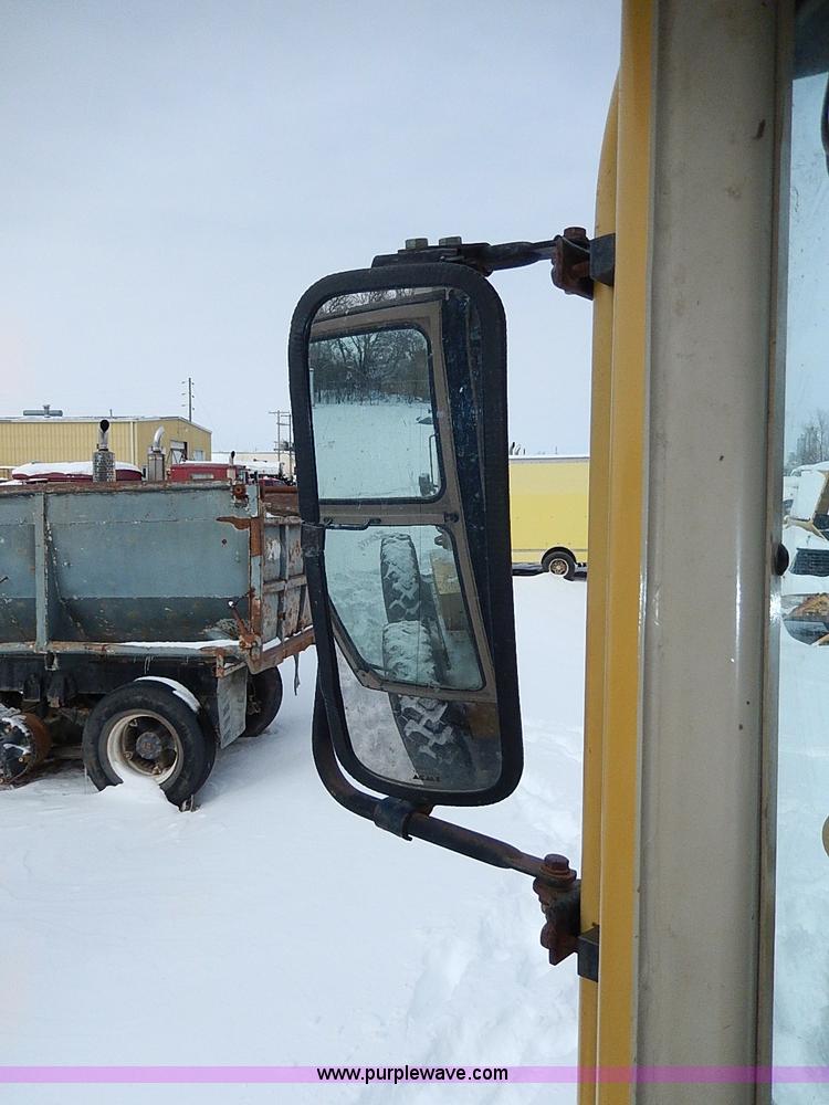 image for item H1314 1999 Caterpillar 140H articulated motor grader