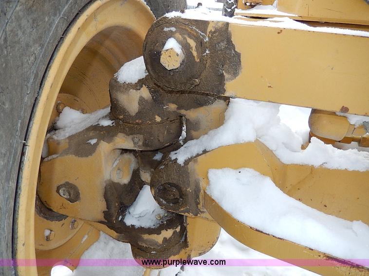 image for item H1314 1999 Caterpillar 140H articulated motor grader