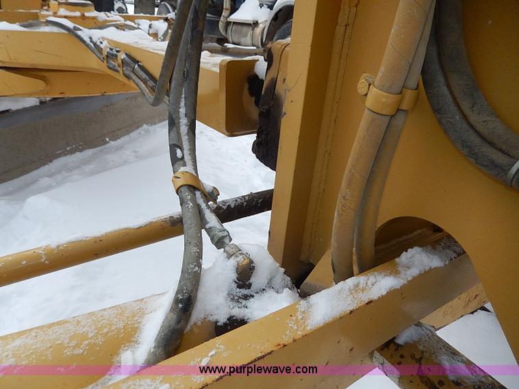 image for item H1314 1999 Caterpillar 140H articulated motor grader