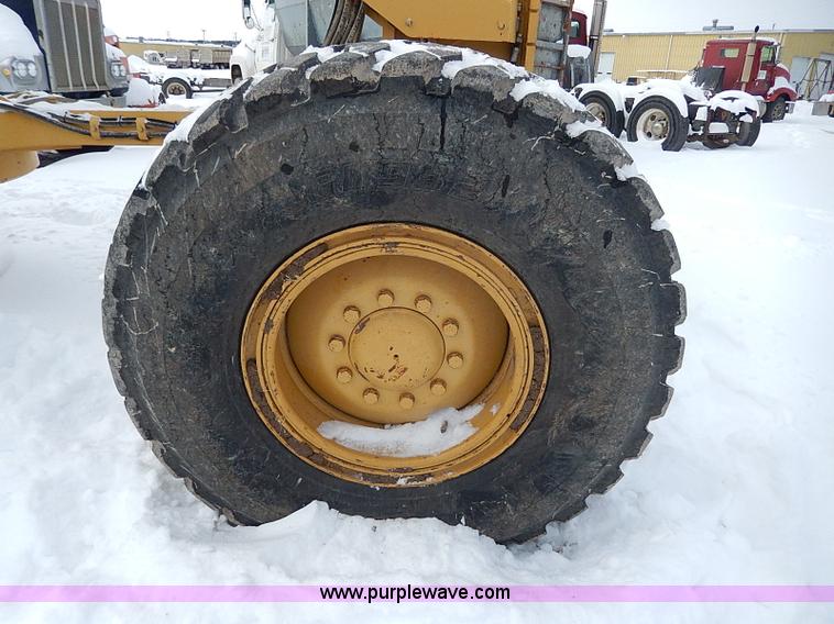 image for item H1314 1999 Caterpillar 140H articulated motor grader