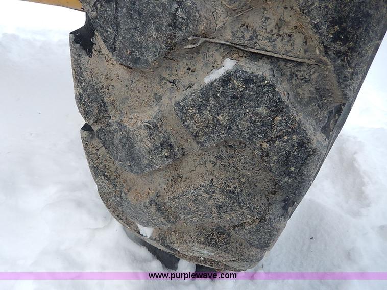 image for item H1314 1999 Caterpillar 140H articulated motor grader