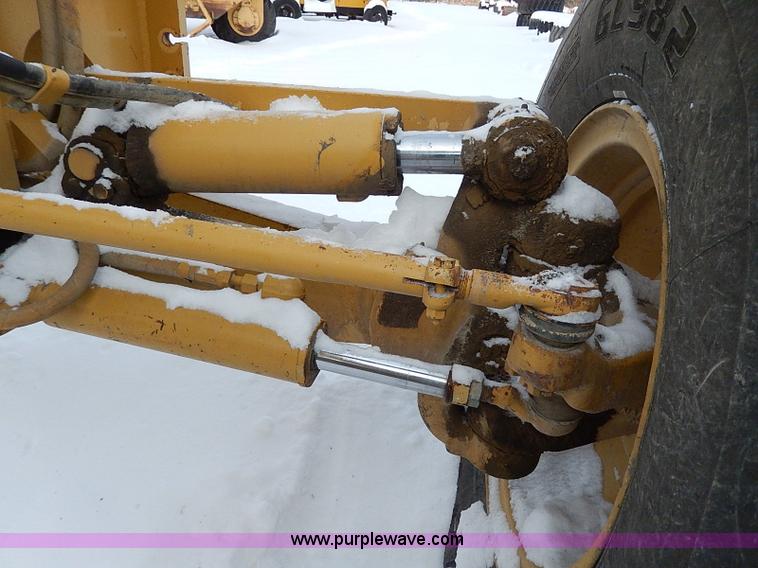 image for item H1314 1999 Caterpillar 140H articulated motor grader