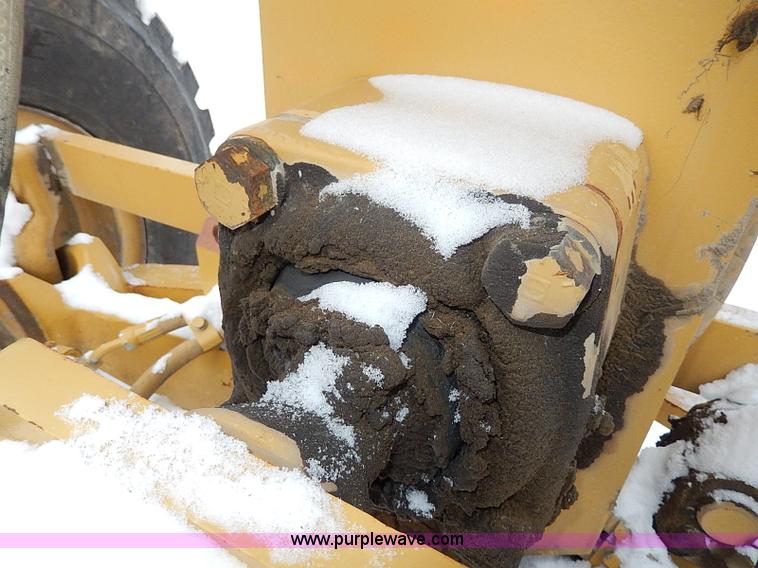 image for item H1314 1999 Caterpillar 140H articulated motor grader
