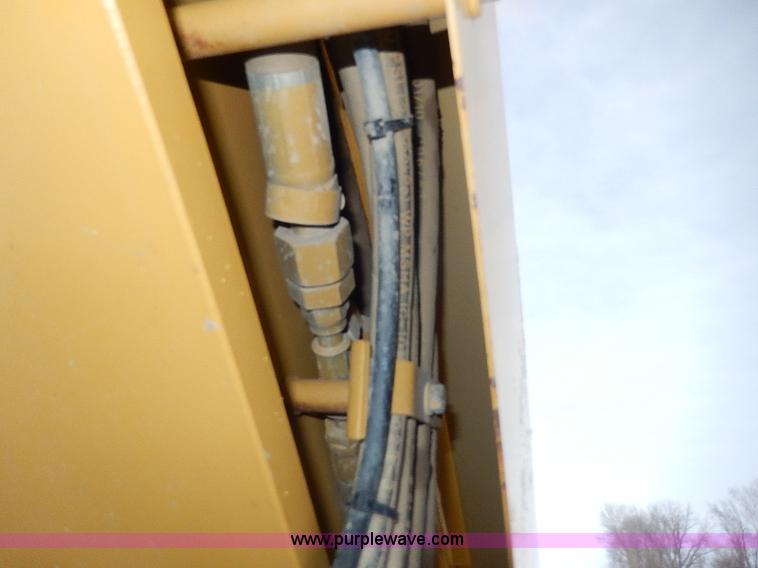 image for item H1314 1999 Caterpillar 140H articulated motor grader