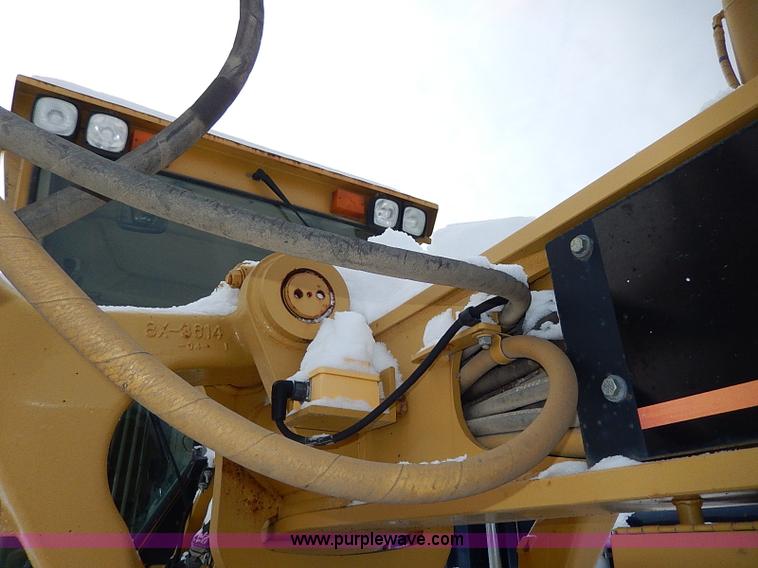 image for item H1314 1999 Caterpillar 140H articulated motor grader