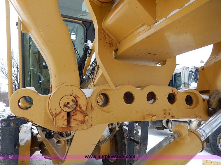 image for item H1314 1999 Caterpillar 140H articulated motor grader