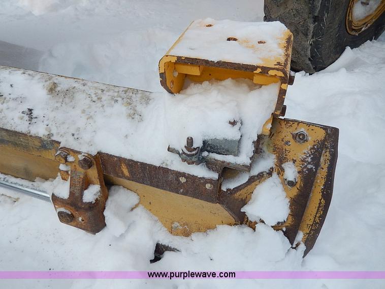 image for item H1314 1999 Caterpillar 140H articulated motor grader