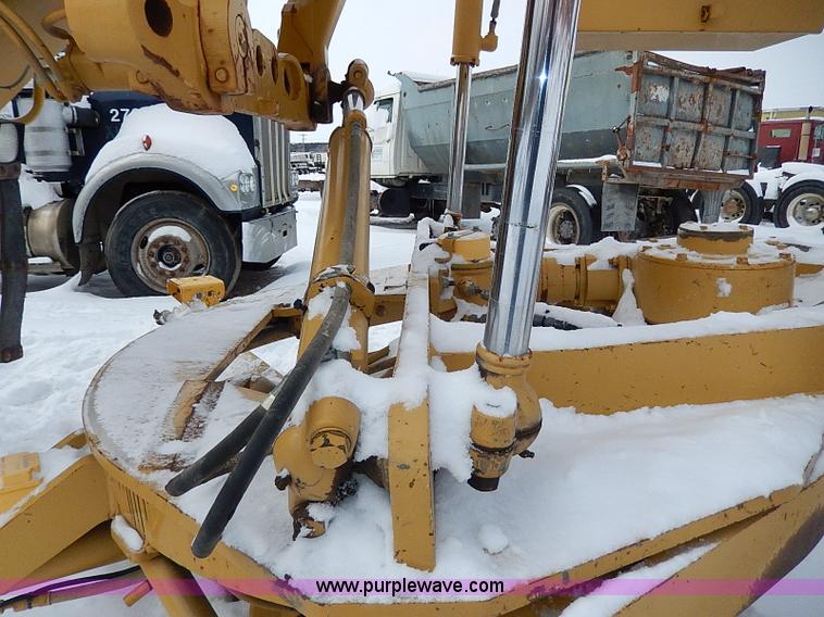 image for item H1314 1999 Caterpillar 140H articulated motor grader