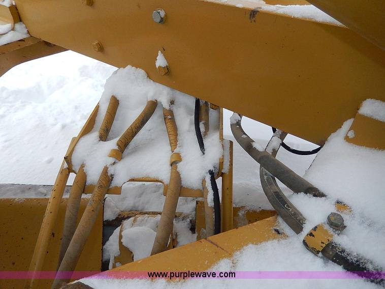 image for item H1314 1999 Caterpillar 140H articulated motor grader