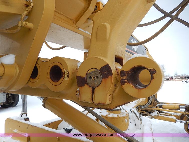 image for item H1314 1999 Caterpillar 140H articulated motor grader