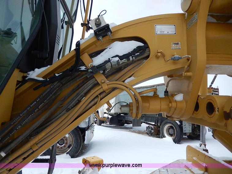 image for item H1314 1999 Caterpillar 140H articulated motor grader